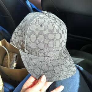 Coach graphite/black logo baseball cap. New with tags. Never worn. Authentic.